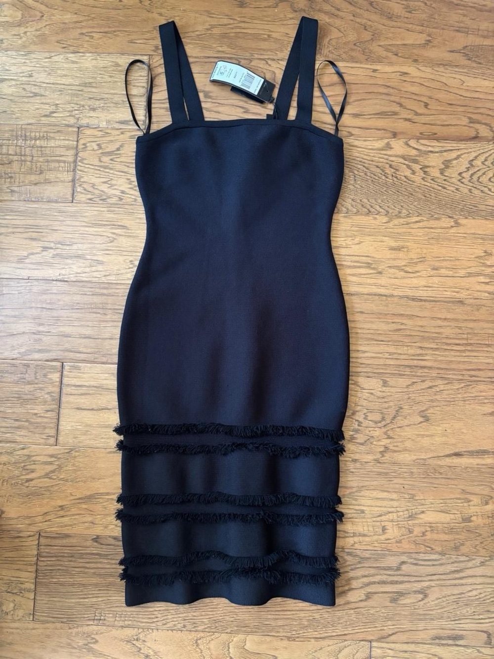 NWT BCBGMAXAZRIA Black Midi Dress with Fringe Detailing at the bottom.
Size XXS